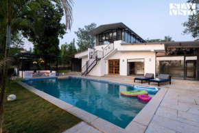 StayVista's The Oasis - Serene Retreat with Private Pool, Lawn & Gazebo